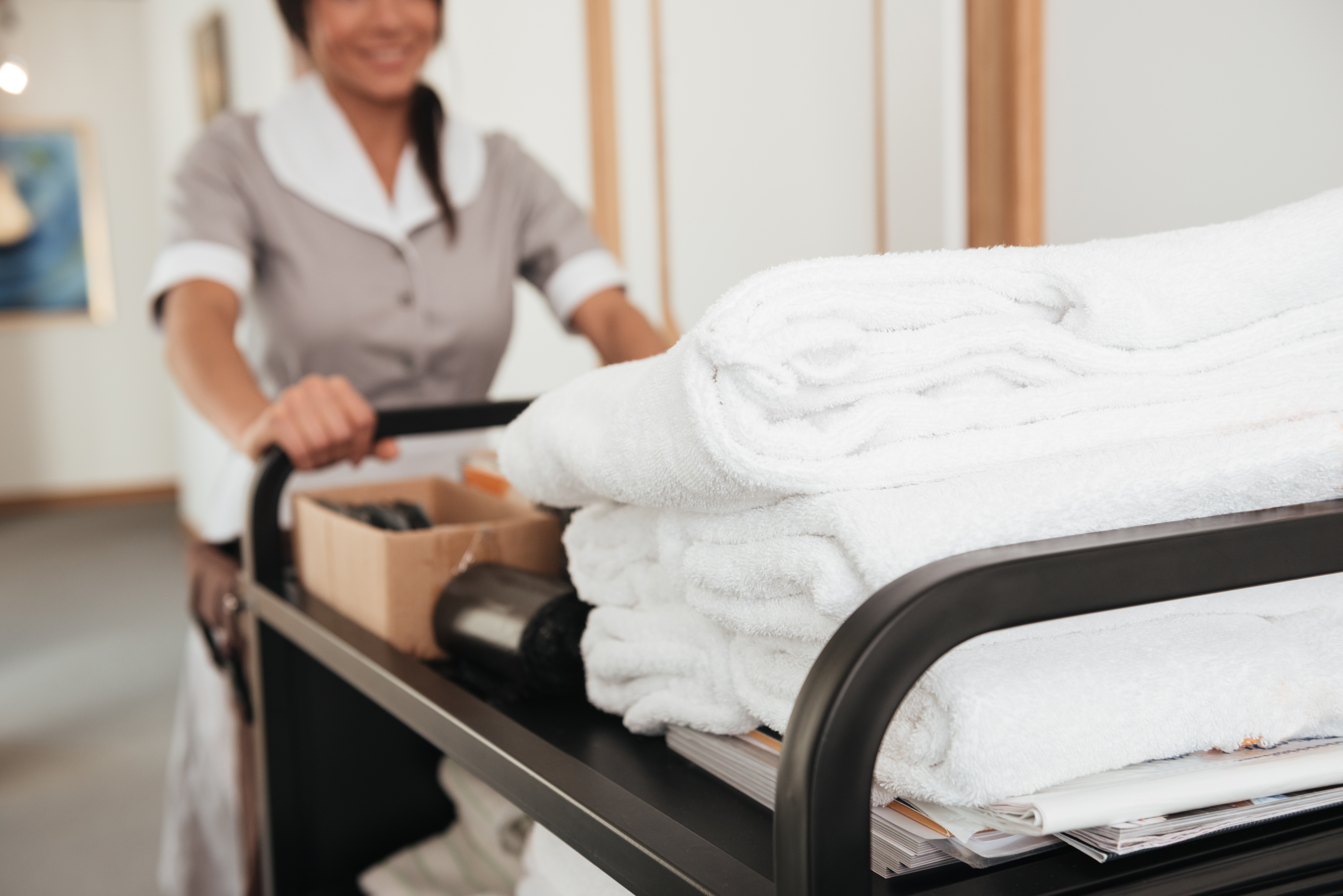 Hotel Employee Pushing cart